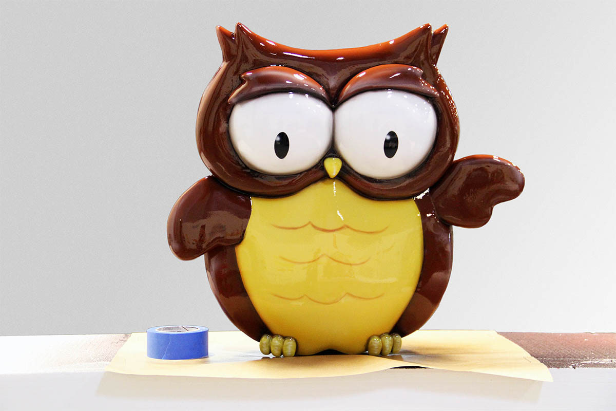 Character Model of an owl next to tape