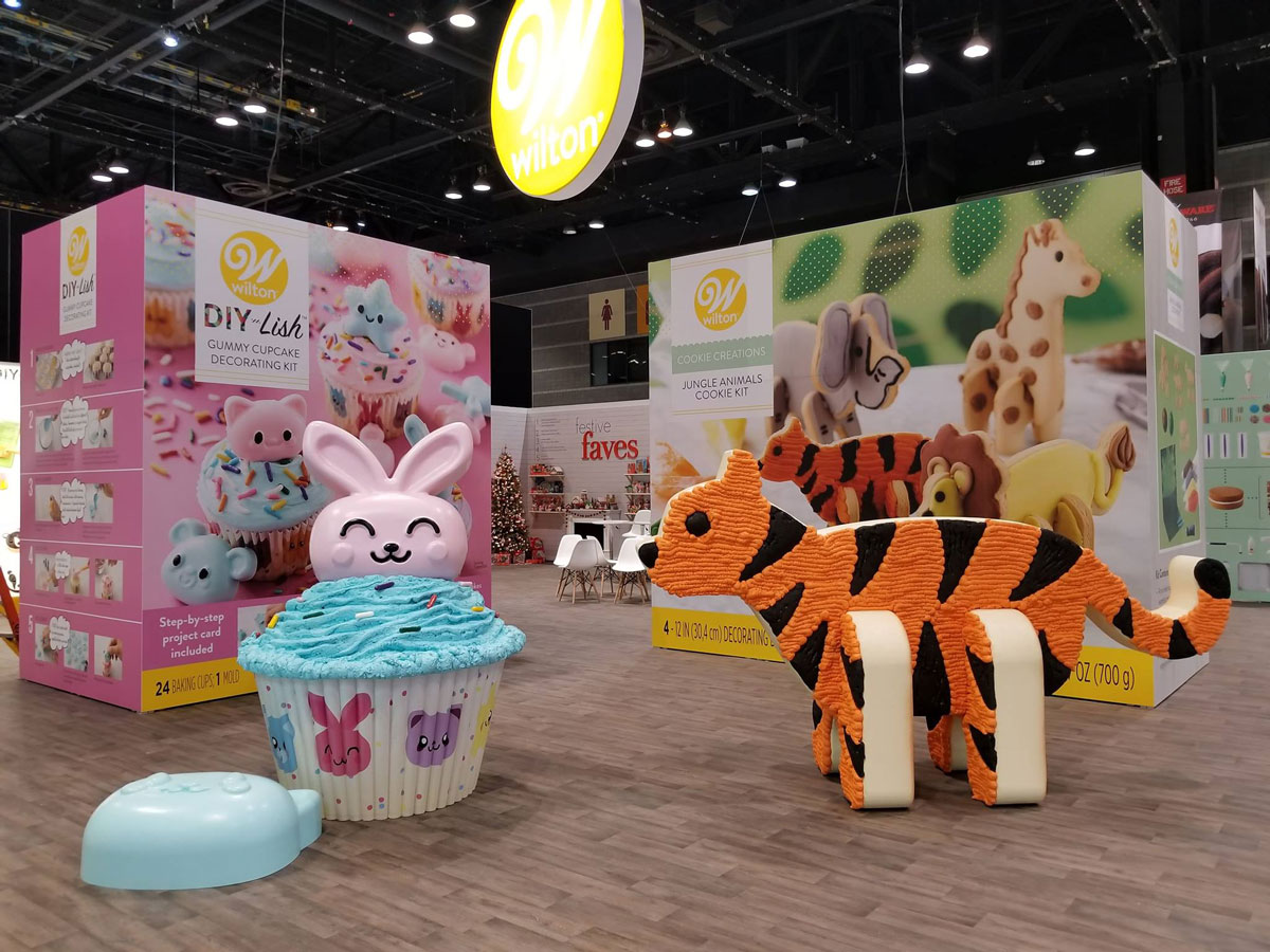 Bunny cupcake and tiger cookie trade show models