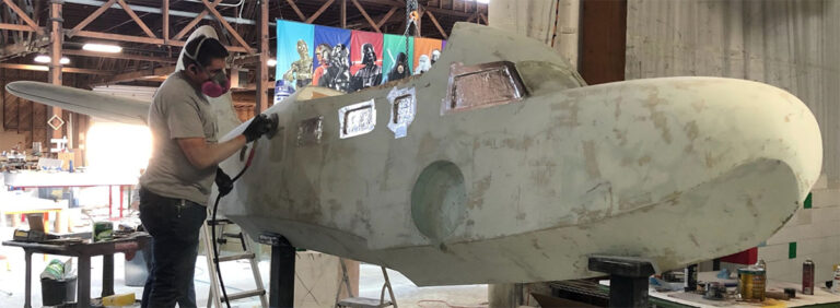 Grumman Goose Seaplane fiberglass being sanded and prepped for paint
