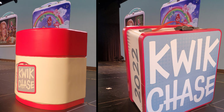 Gigantic lunchbox replica prop is about 7'x7'x4'. It was created, along with a huge thermos, for a special marketing conference event.