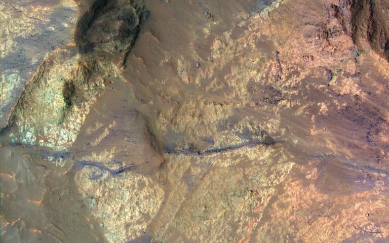 Light-Toned Materials on the Floor of Coprates Chasma