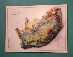 Custom 3D raised relief geological topography map of South Africa, created for a customer in the Netherlands using authentic elevation data to show the landscape in detailed three-dimensional form.