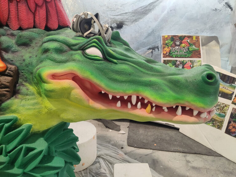 Airbrushing the alligator head for the Rainforest Cafe sign