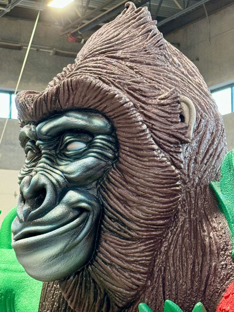 Airbrushing the gorilla head for the Rainforest Cafe sign