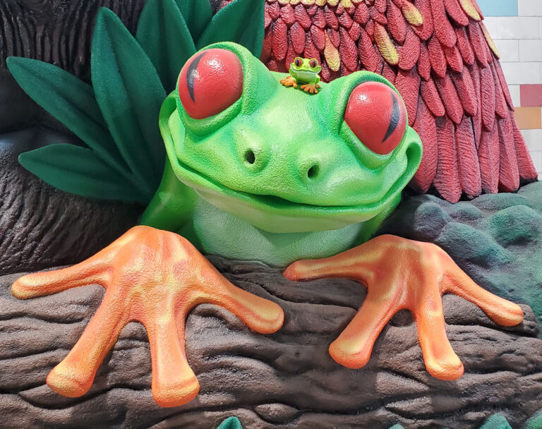 Disney Animal Kingdom Rainforest Cafe sign Red Eye Tree Frog closeup