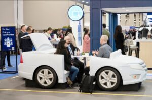 Walmart GoLocal Car Bench Prop displayed at Shoptalk 2024.