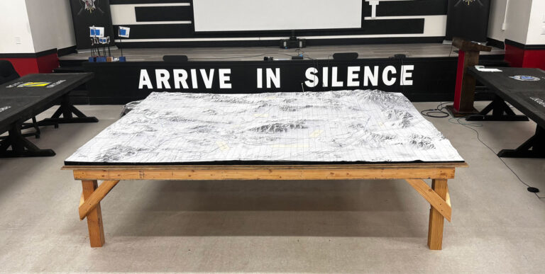 Large 8-foot by 10-foot 3D raised relief map of Fort Irwin Army Base in California and the surrounding Mojave Desert, created for U.S. Army tactical educational training.