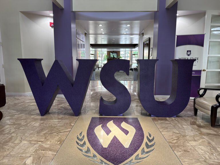 4 foot tall foam letters for Weber State University are temporarily displayed in one of the building's lobby.