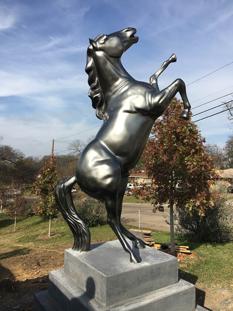 Outdoor horse statue reference shown on a substantial base