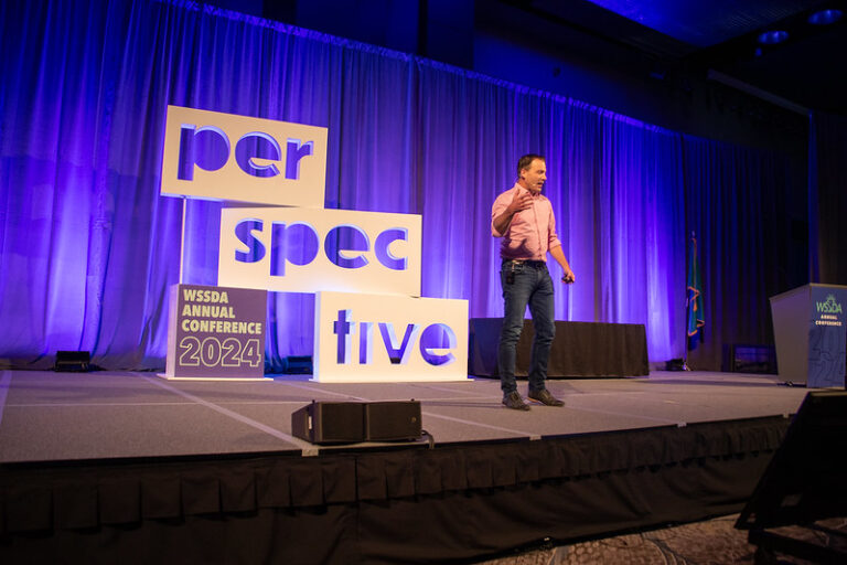 WSSDA conference 2024 stage signage Per-spec-tive
