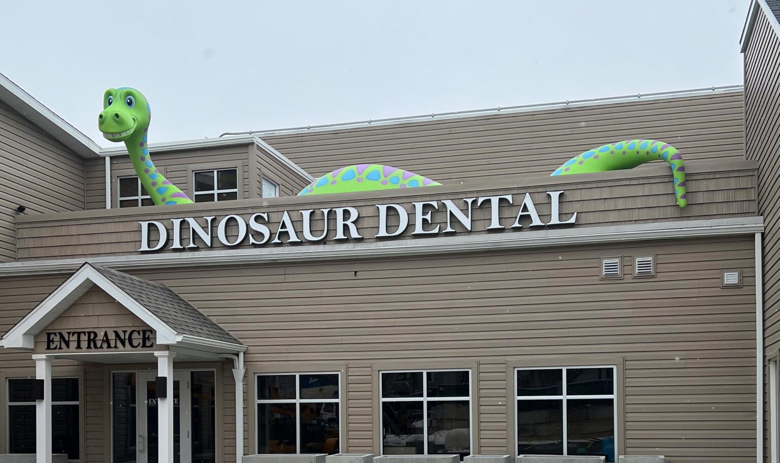 Completed children's dental building dinosaur mascot