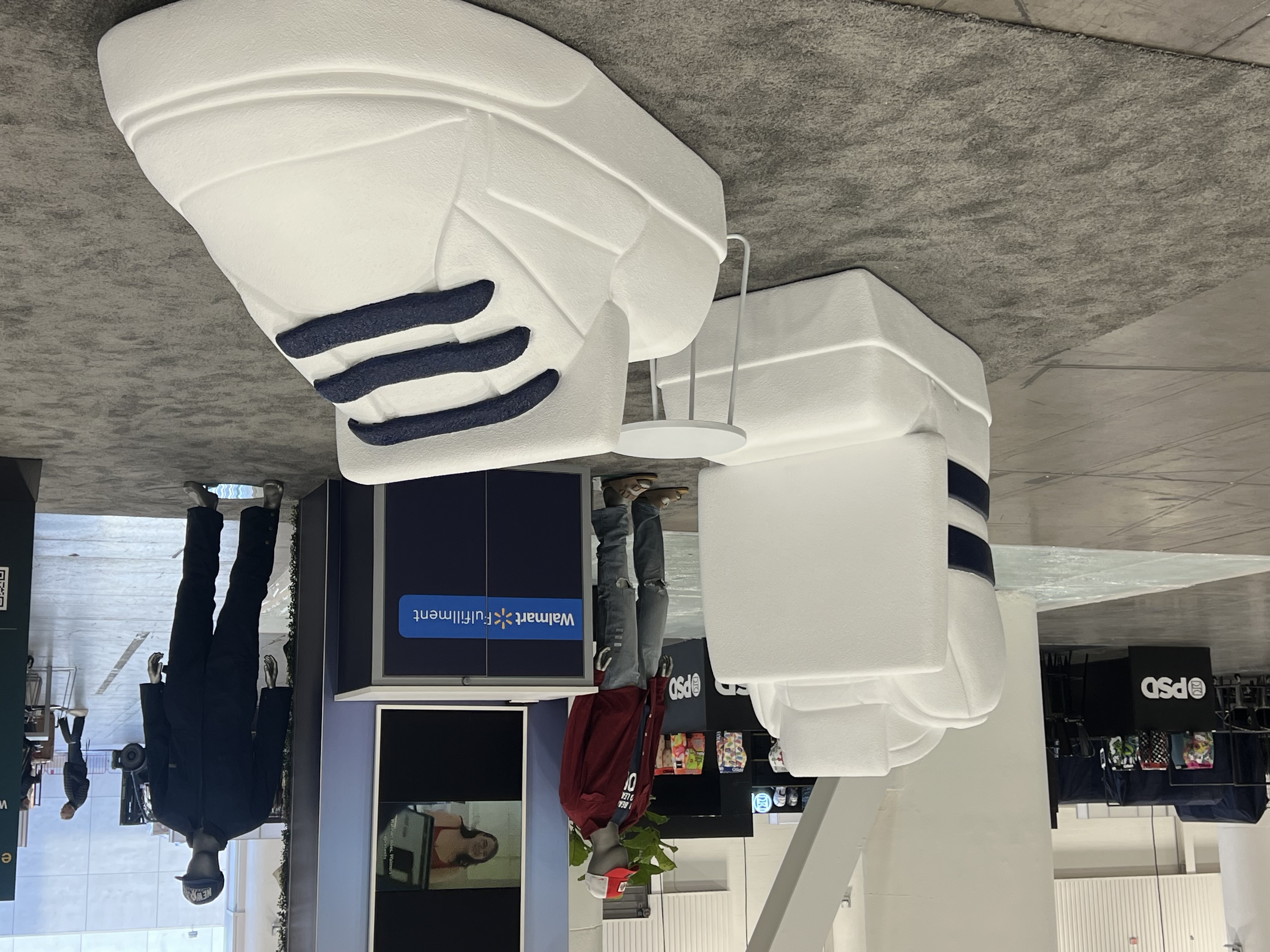 Giant tennis shoe chair prop fabricated for Walmart Marketplace expo displays.
