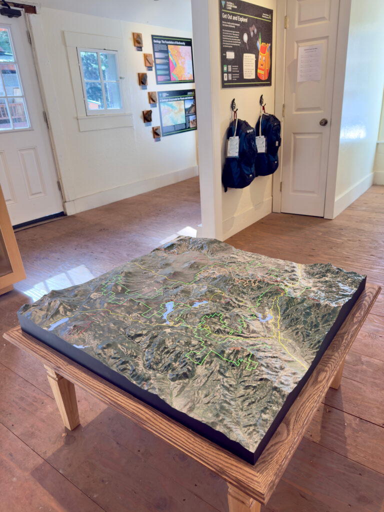 Custom 36-inch by 36-inch 3D topographical map of Cascade-Siskiyou National Monument, created for the Bureau of Land Management as a permanent indoor display with high-resolution imagery and up to 40 custom labels.