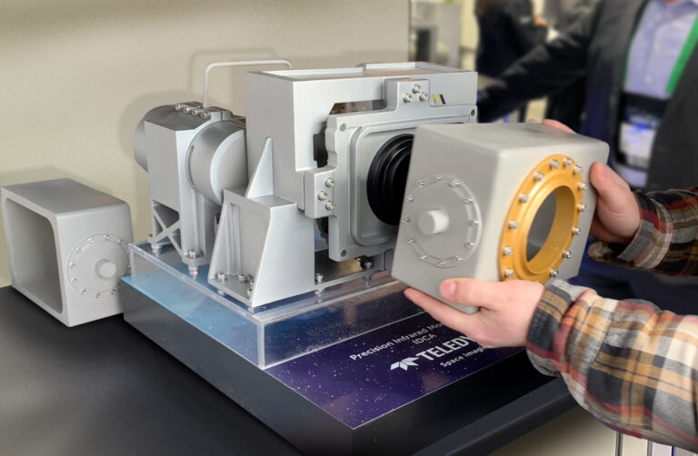 Miniature Teledyne IDCA space imaging camera model fabricated for trade show product presentation.
