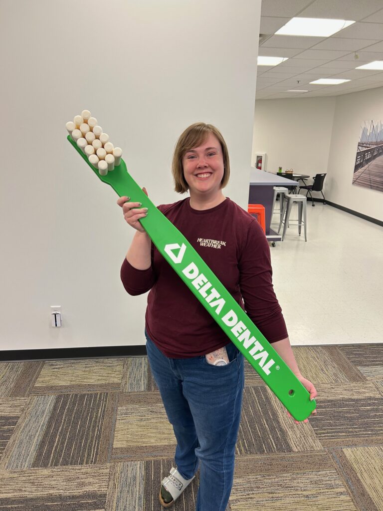 Oversized 4-foot toothbrush prop fabricated for an educational dental health program.