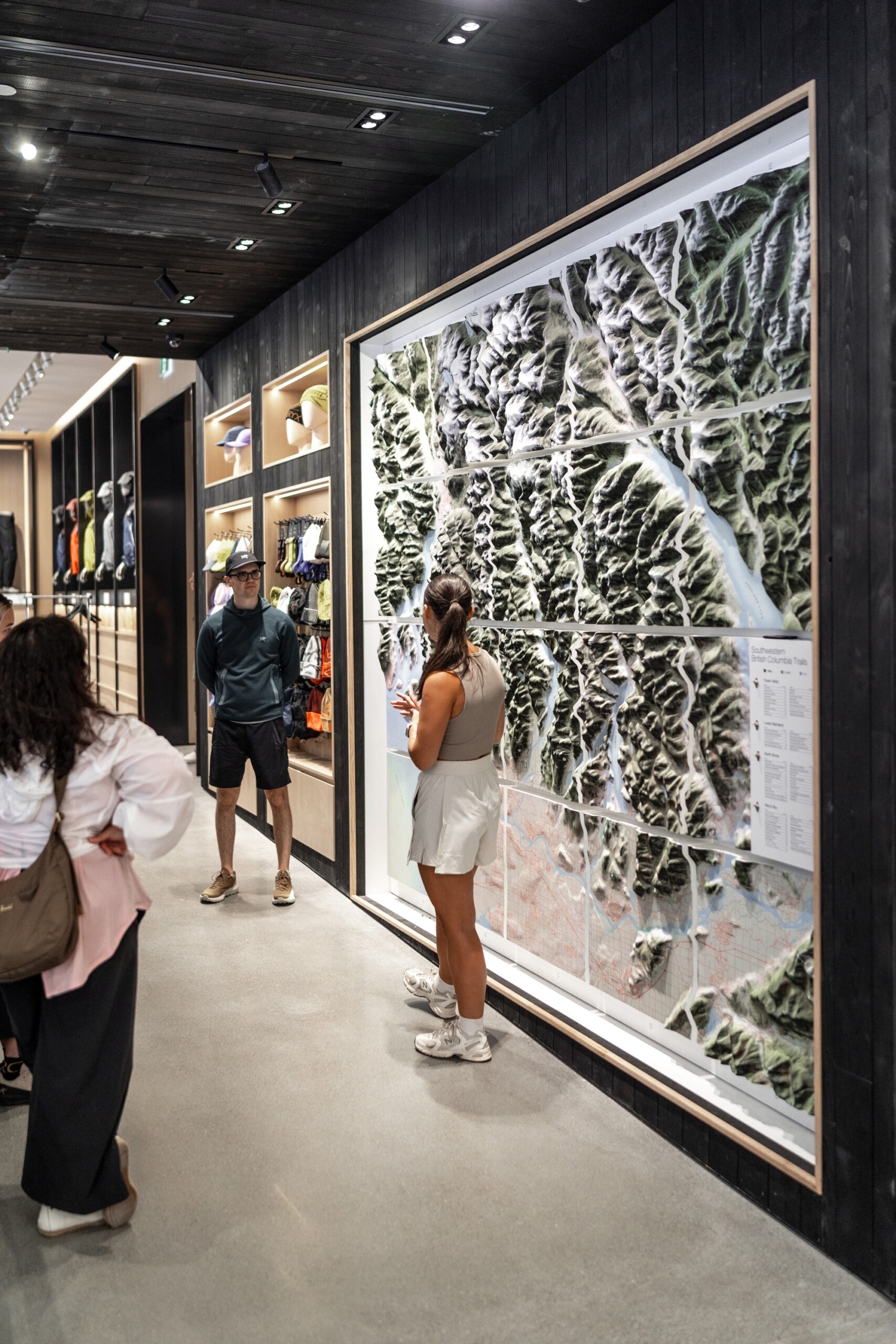 Custom illuminated raised relief map display for a retail store