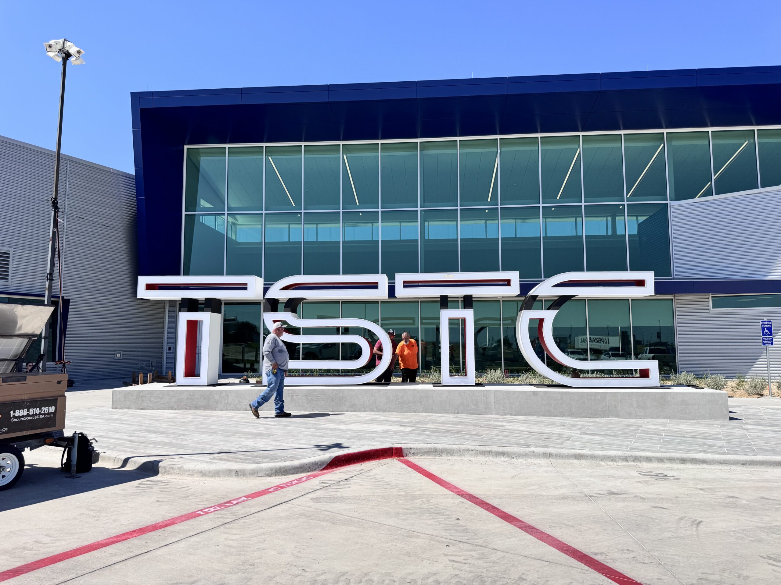 Eight-foot illuminated TSTC metal letters fabricated by WhiteClouds