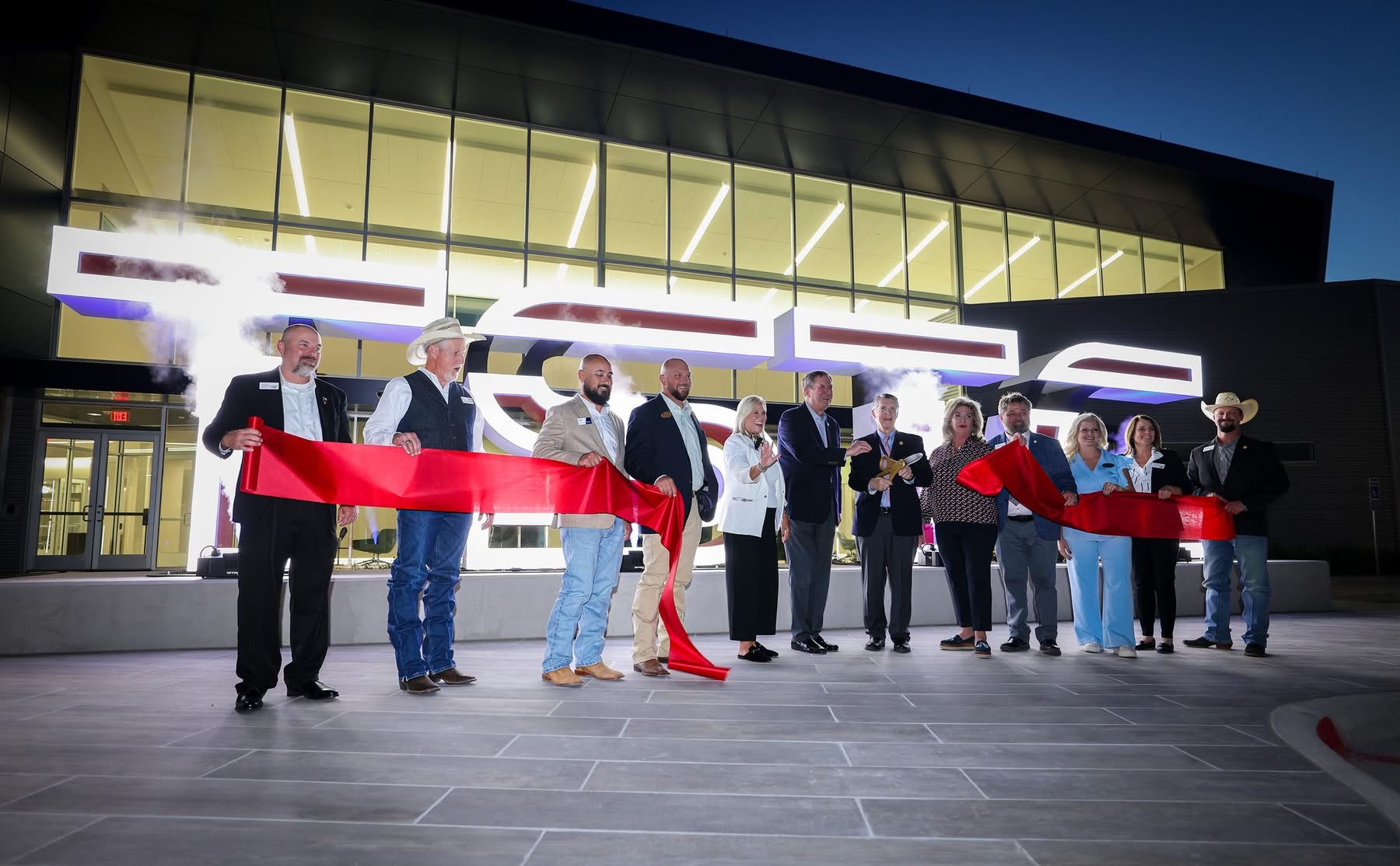 Illuminated TSTC letters during the Power and Mechanical Center ribbon cutting
