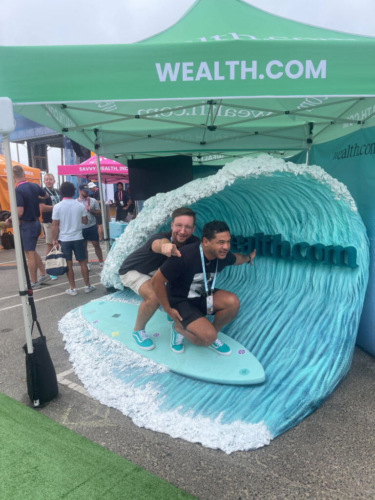 Wealth.com trade show photo prop