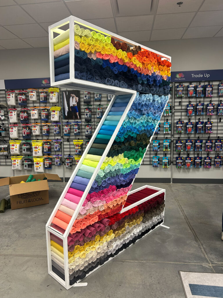 Custom Z Metal Tubing – Fillable display for Fruit of the Loom | JERZEES turns t-shirt merchandising into a statement piece.