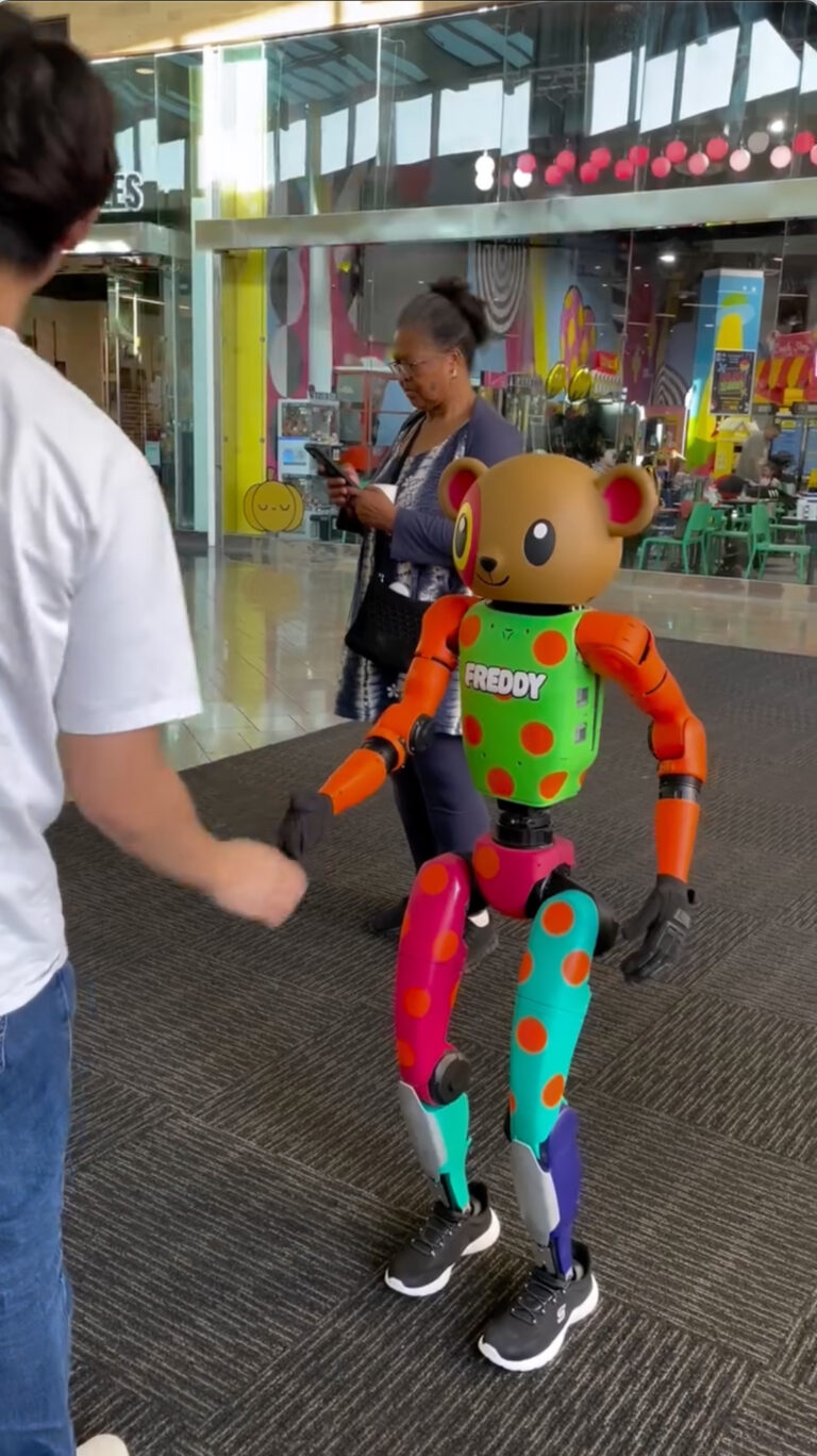 Customized moving and interactive robot character prop fabricated for Funbox inflatable park locations.