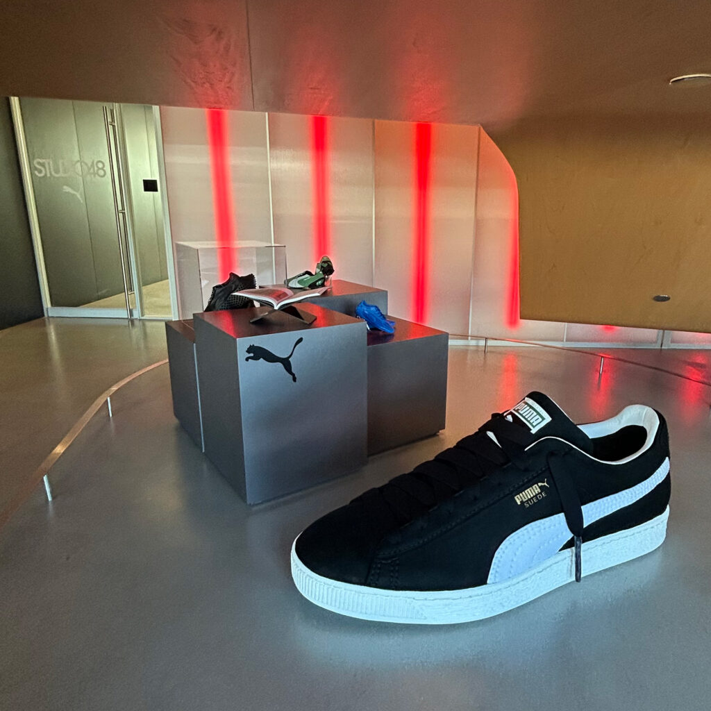 Approximately five-foot-long black and white PUMA Suede giant shoe replica