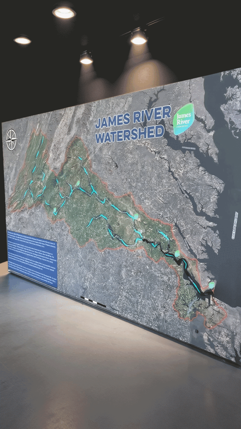 Custom interactive 3D watershed model created for the James River Association, featuring detailed terrain, animated illuminated LED lighting that shows river flow, drainage features, and student LEGO Build the Change models.