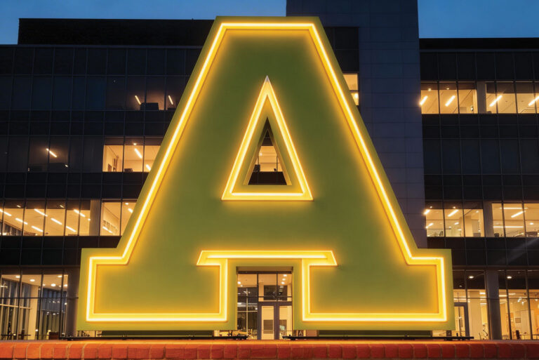 Illuminated Metal Letter at night