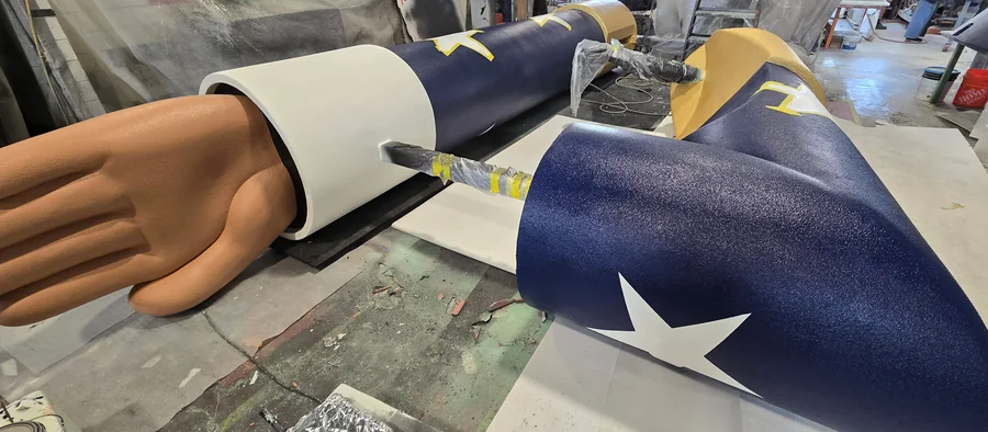 Fabricated arms and hands for the giant Luverne nutcracker