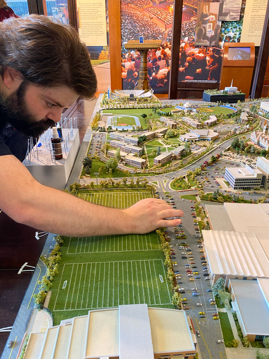 WhiteClouds model maker refining a detailed custom campus model