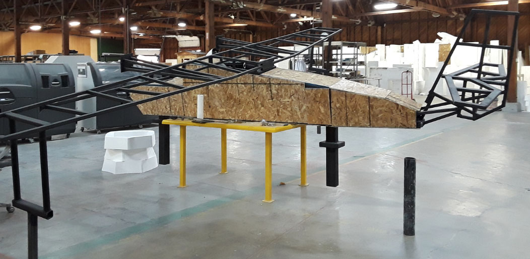 WhiteClouds Industrial Studio with a large fabricated metal structure in progress