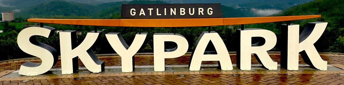 Gatlinburg SkyPark metal logo display fabricated for outdoor visitor photos and brand visibility.